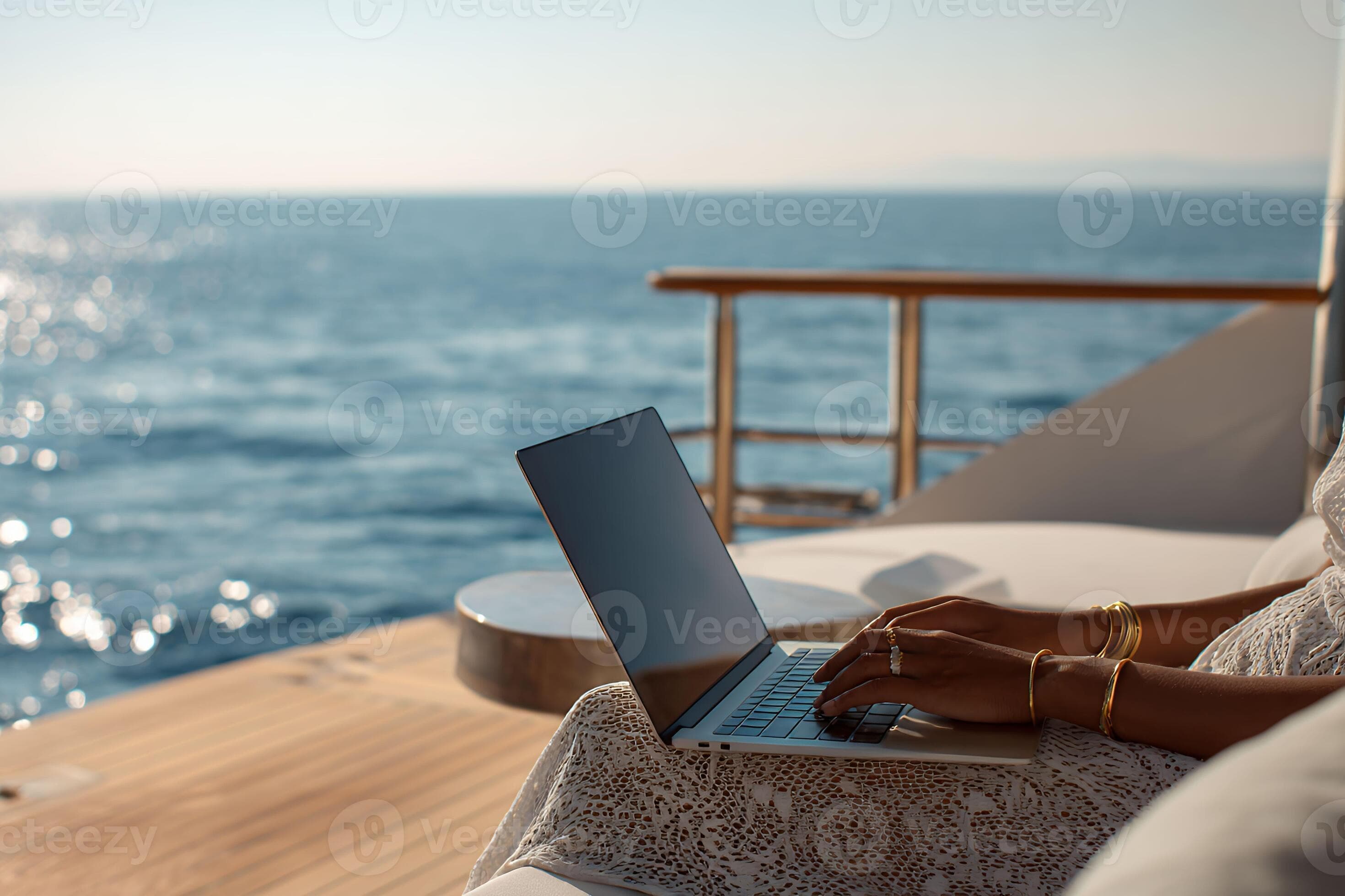Working Remotely on a Yacht with Laptop Near Ocean View