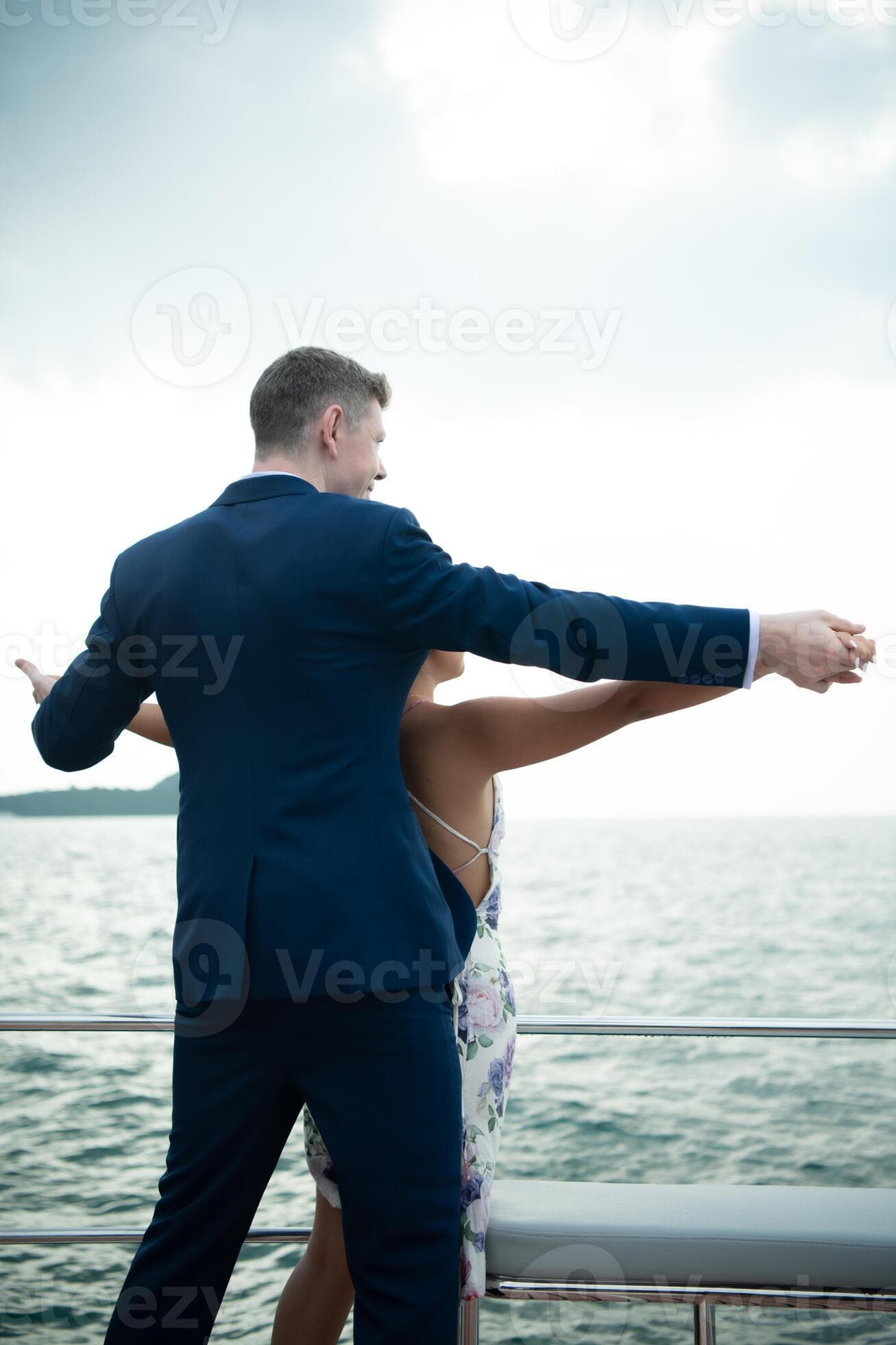 Happy moments of interracial couples on a yacht The couple had their honeymoon at one of Asia's