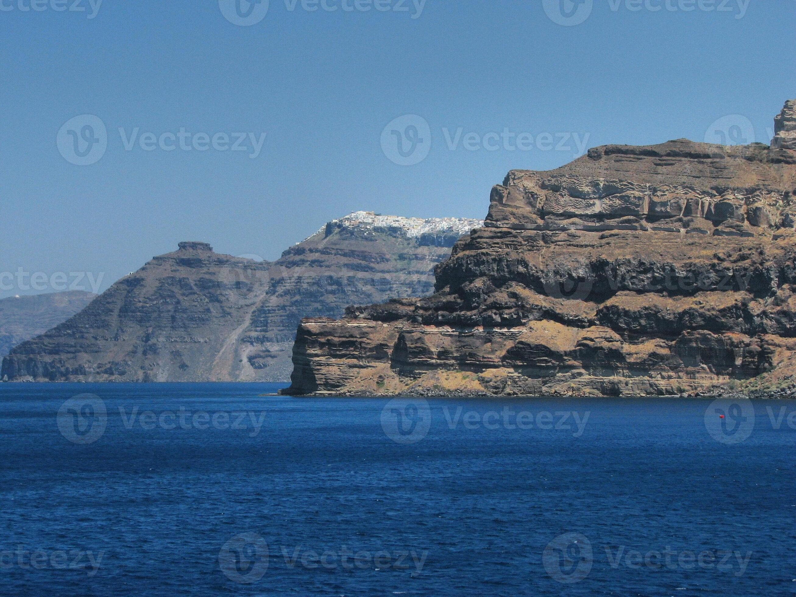 A large body of water near coast of Santorini